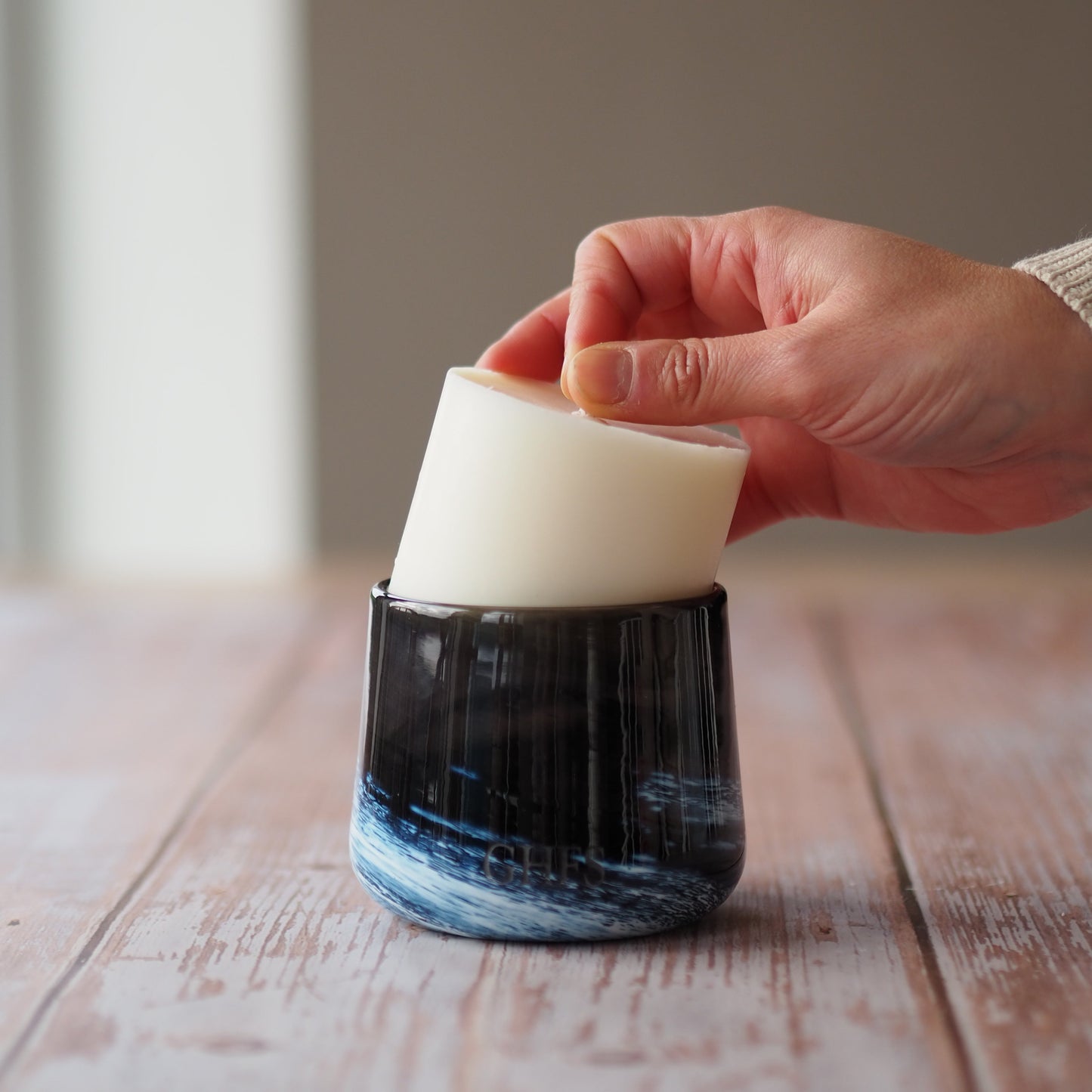 Milky way candle being refilled