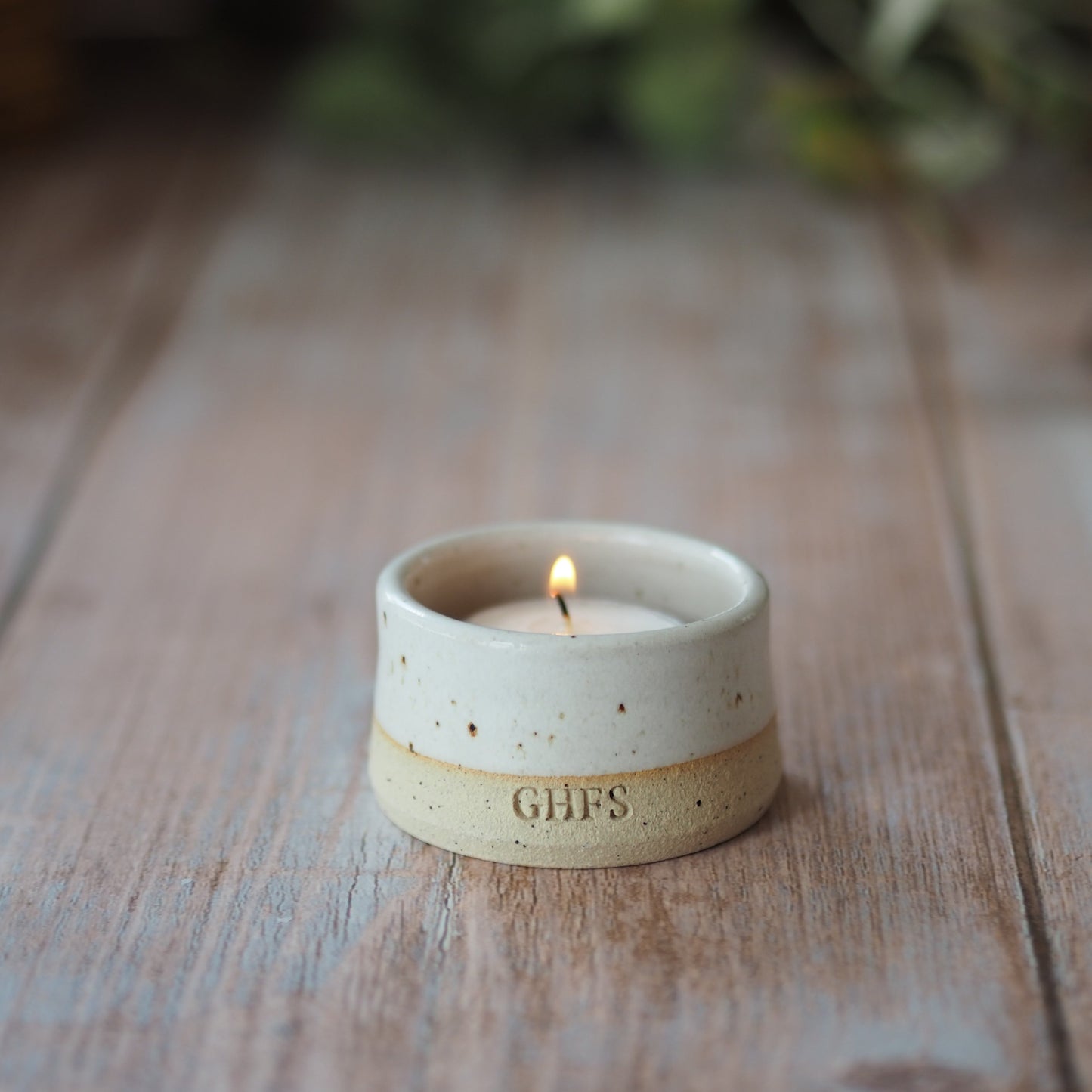 white speckle tealight holder lit autumn