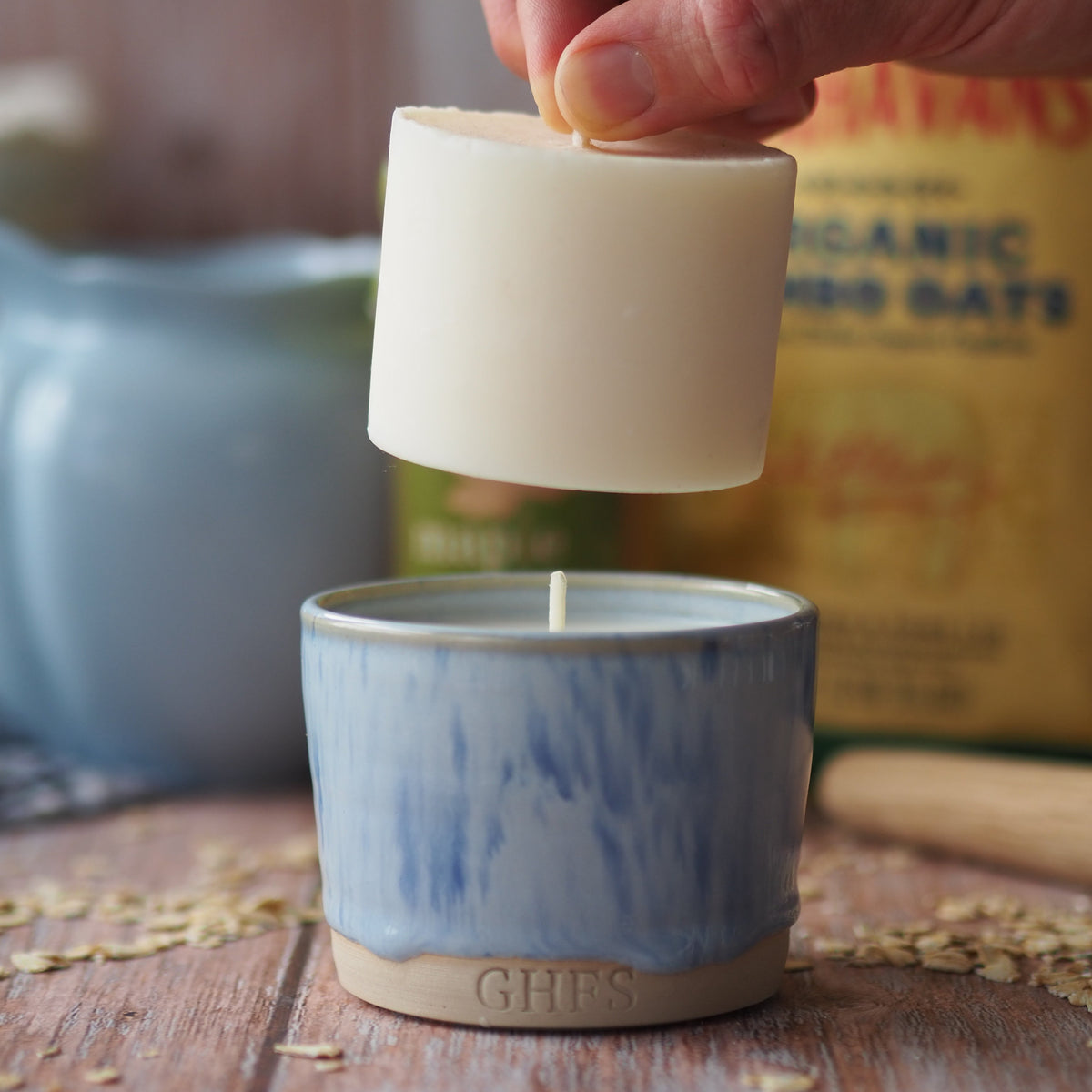 winter candle being refilled