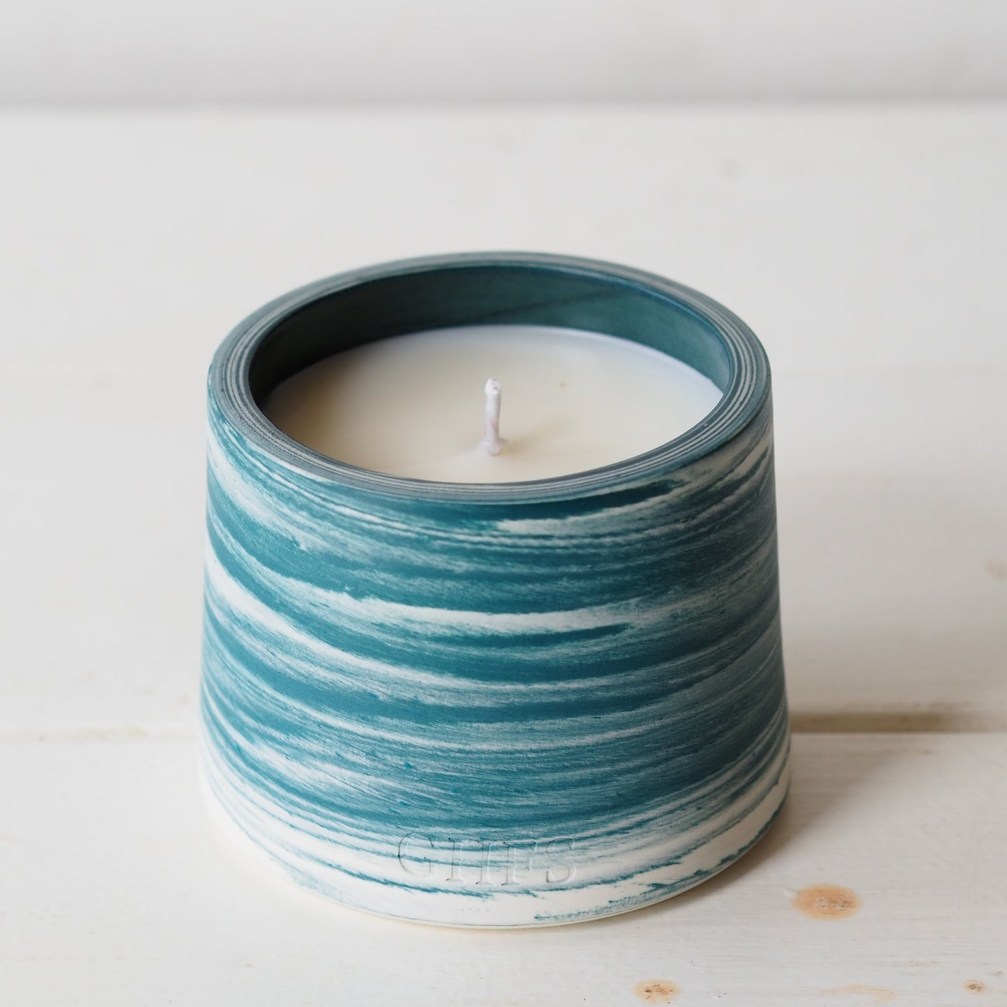Explore refillable candle